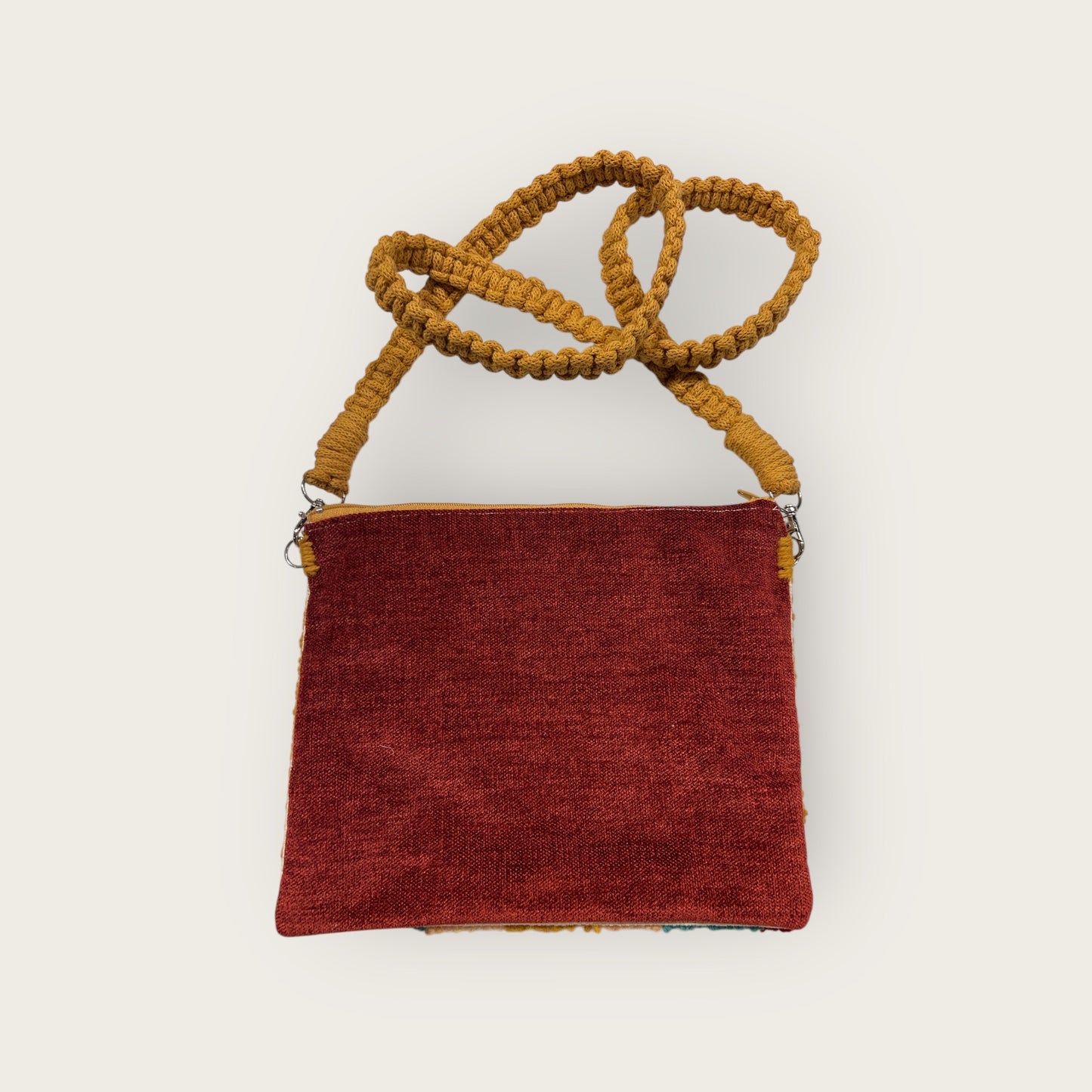 back view of zipper purse with coordinating red velour fabric