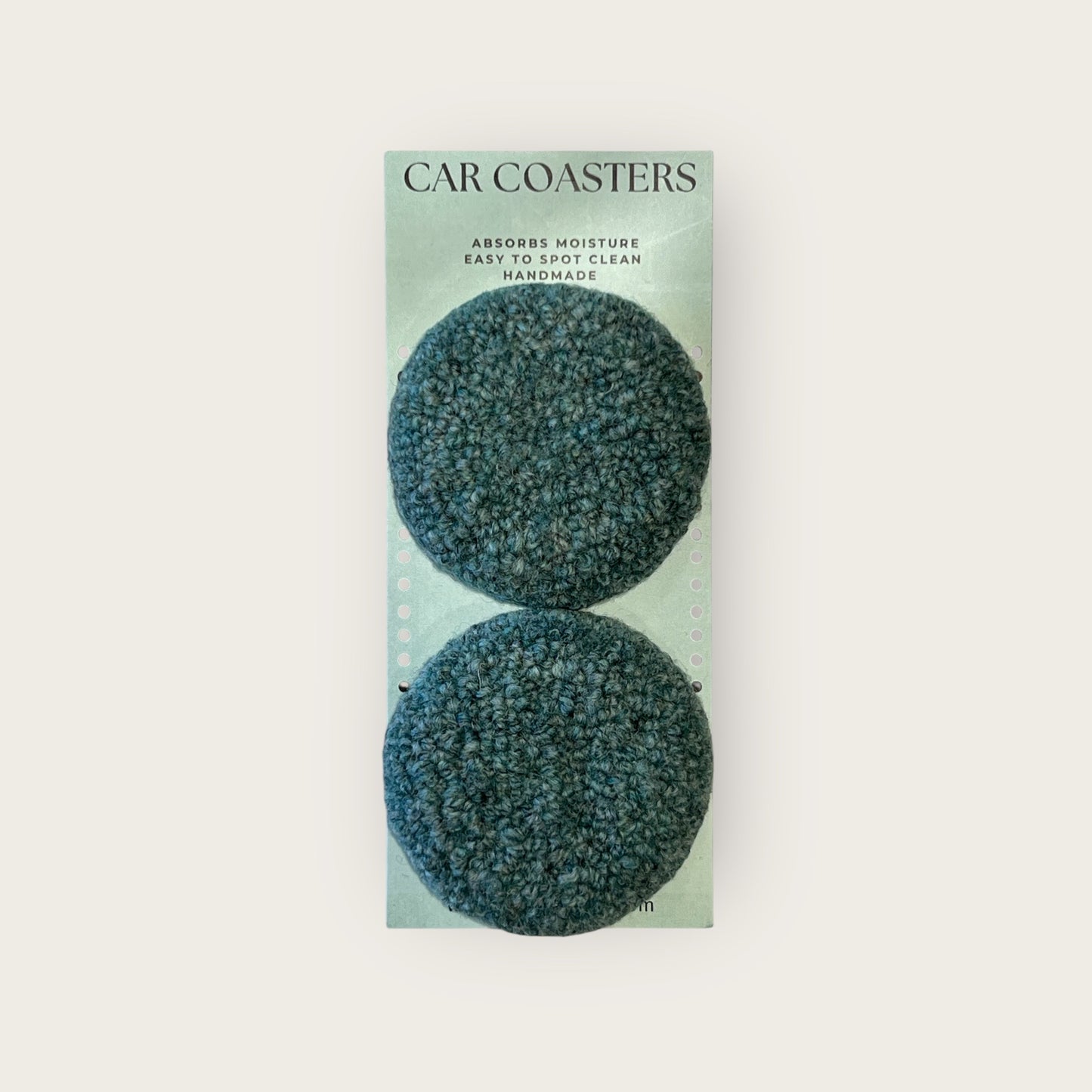 2 solid sage colored punch needle coasters