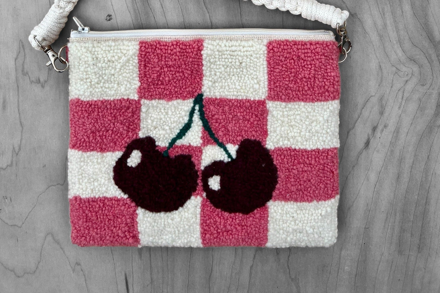 another view of purse highlighting the vibrant color of the purse with black and white background