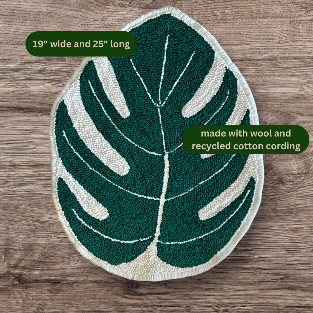 19 inches wide and 25 inches long; made with wool and recycled cotton cording