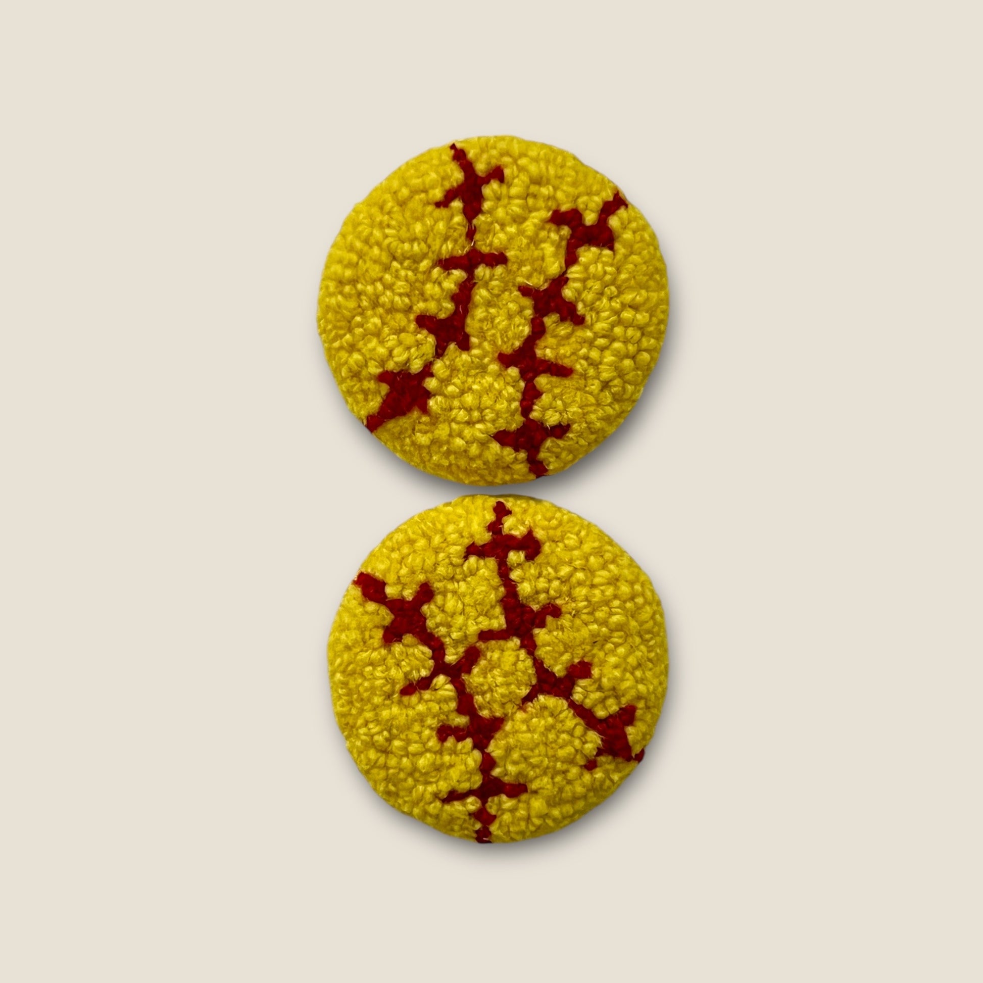 pair made of wool to put in the cup holder of your car for absorbing moisture of drink