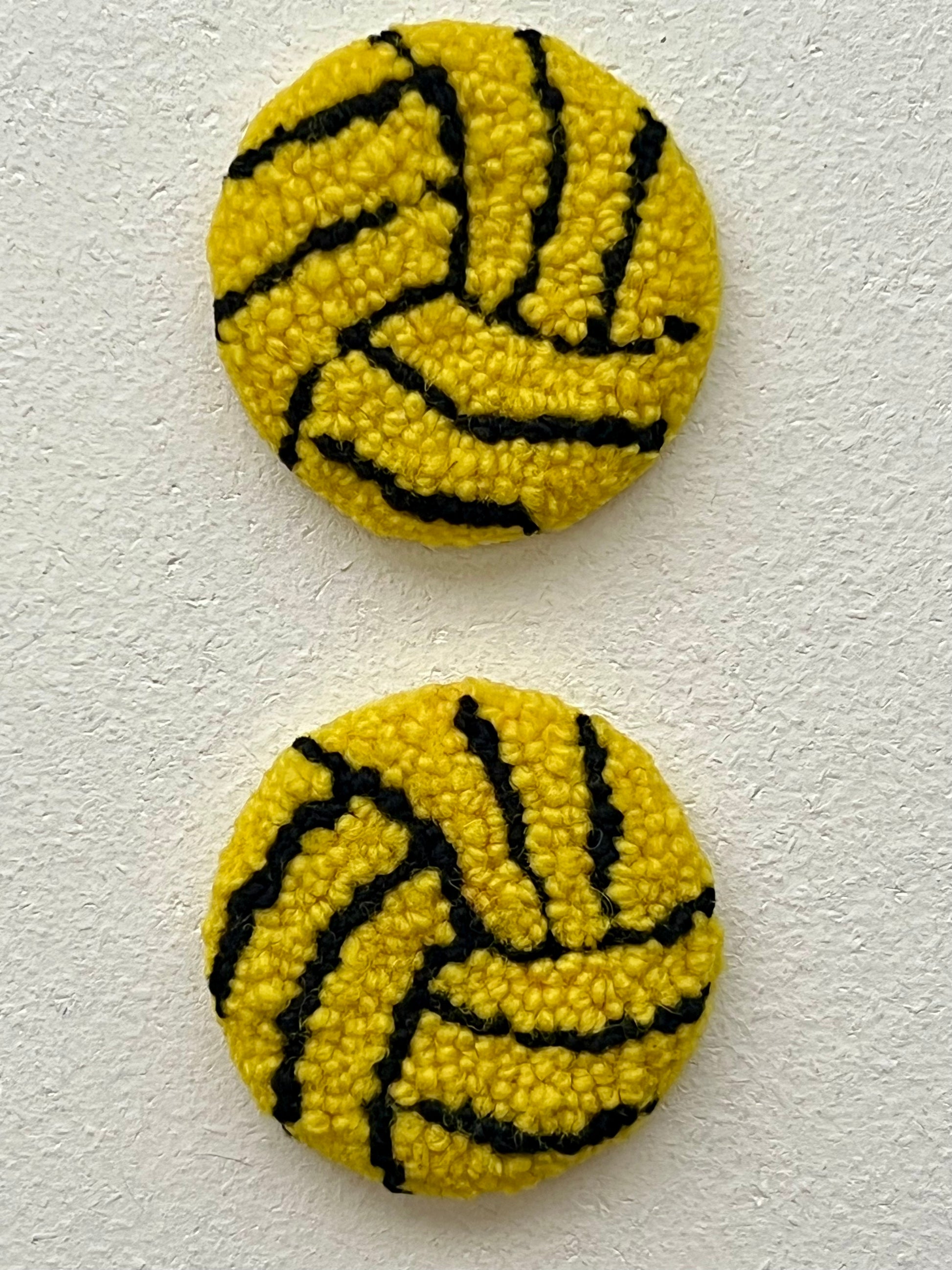 pair made of wool to put in the cup holder of your car for absorbing moisture of drink